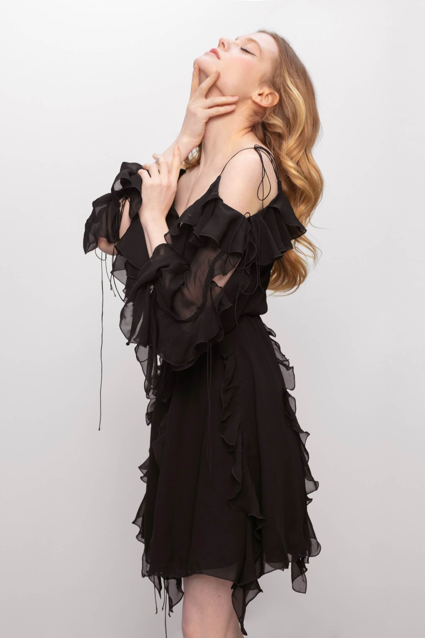 Model in Model in Morning Forest black mini dress side view