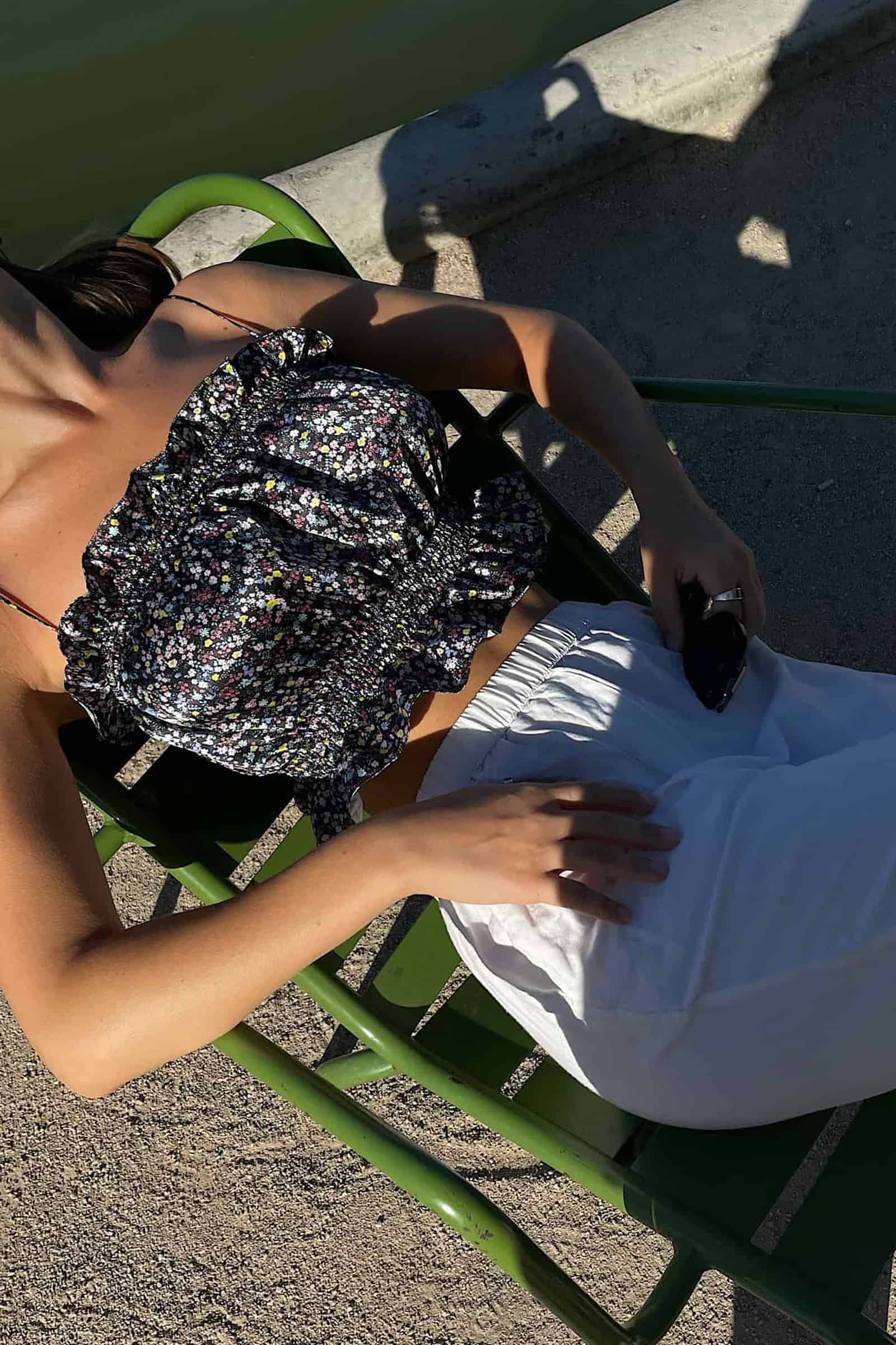 Model in floral off shoulder Pastorale top