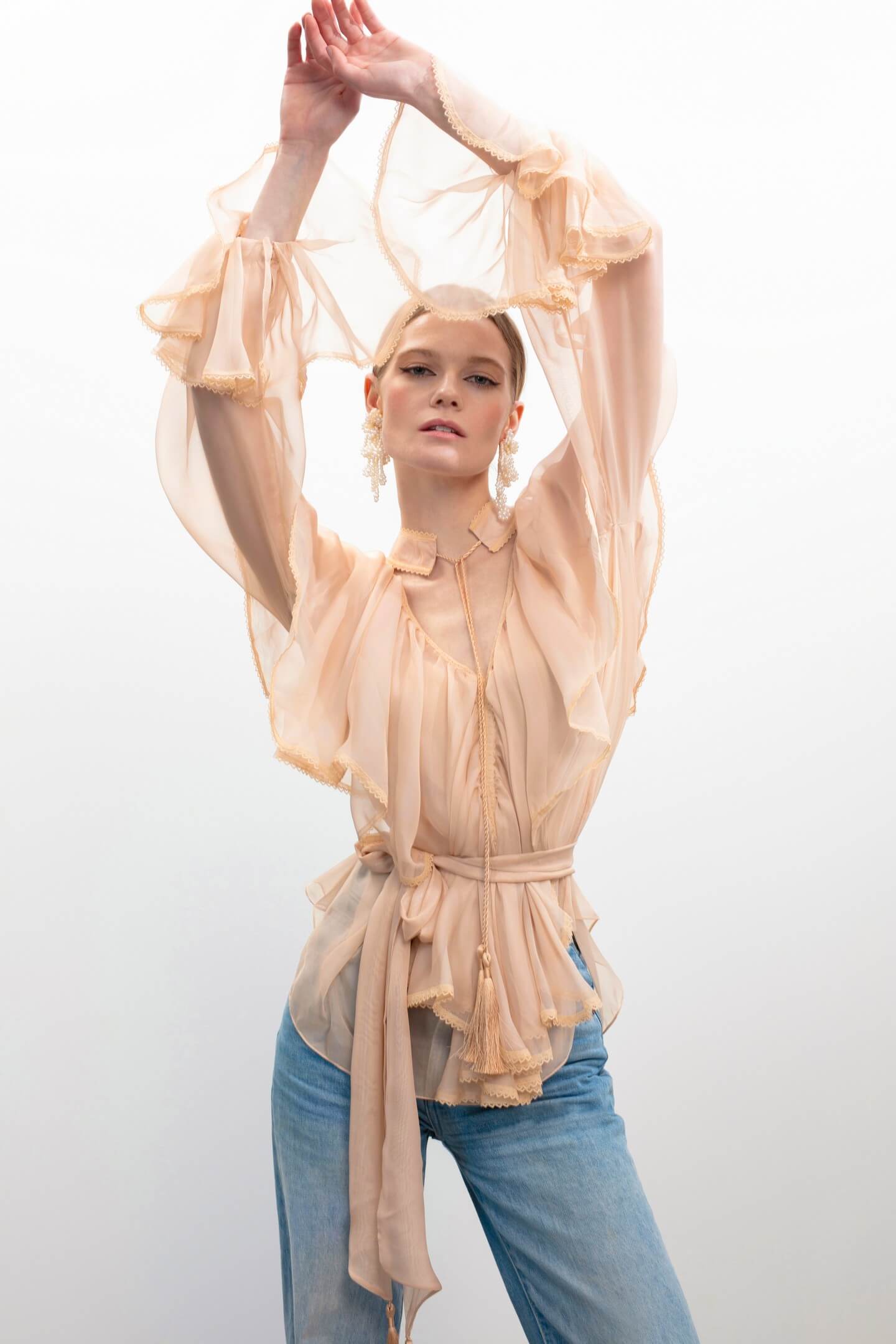 Model in Ocean Of Tenderness blouse front view